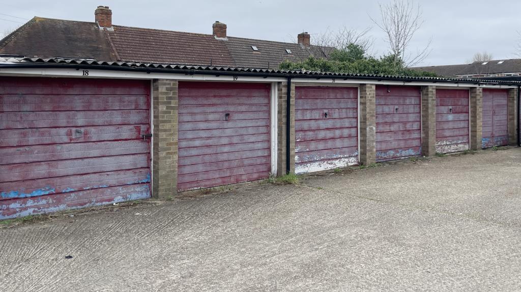 Lot: 111 - LAND AND GARAGES - View of garages 18 - 23